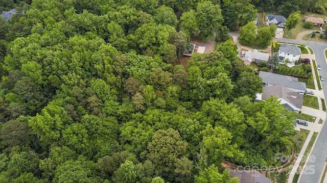 500 Peigler St NW Unit 1 & 2, Concord, NC 28027 - aerial perspective of suburban area with a heavily wooded area