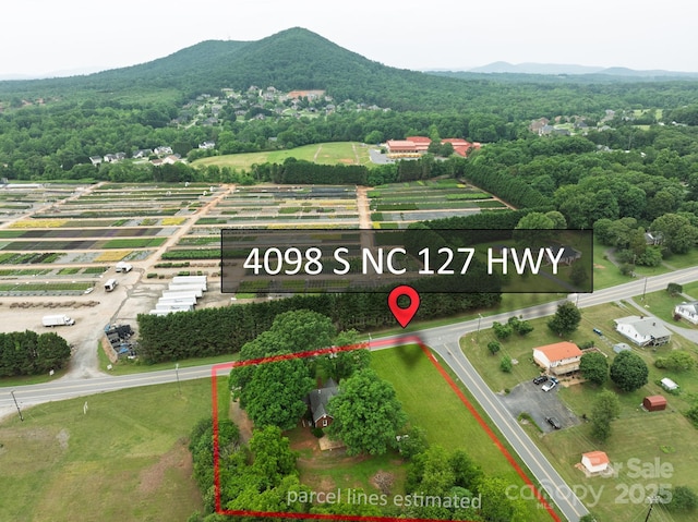 4098 S NC Highway 127, Hickory, NC 28602 - aerial view of sparsely populated area featuring property boundaries highlighted and mountains