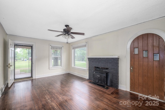 4098 S NC Highway 127, Hickory, NC 28602 - unfurnished living room featuring wood finished floors, plenty of natural light, ceiling fan, and baseboards