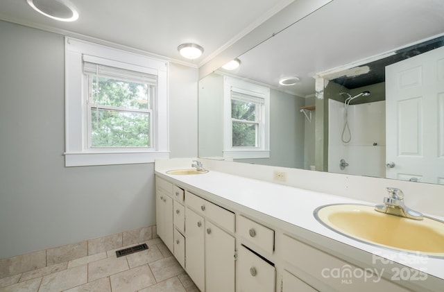 4098 S NC Highway 127, Hickory, NC 28602 - full bathroom featuring double vanity, a shower, tile patterned floors, and ornamental molding