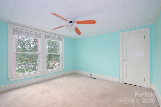 4098 S NC Highway 127, Hickory, NC 28602 - carpeted spare room with baseboards, ceiling fan, and ornamental molding