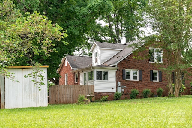 4098 S NC Highway 127, Hickory, NC 28602 - view of side of property with a shingled roof and brick siding