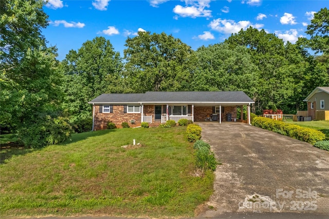 157 E Meadowview Dr, Statesville, NC 28625 - ranch-style house with driveway, a front lawn, brick siding, and an attached carport