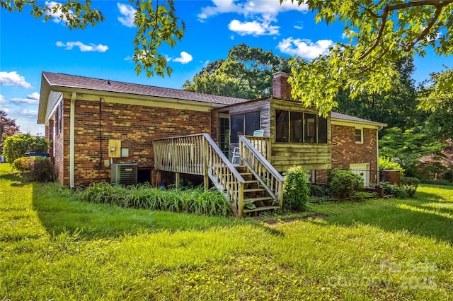 157 E Meadowview Dr, Statesville, NC 28625 - back of house with stairs, a sunroom, brick siding, a chimney, and a wooden deck