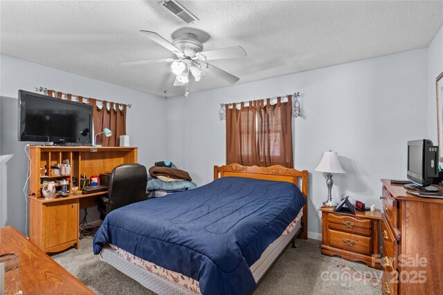 157 E Meadowview Dr, Statesville, NC 28625 - carpeted bedroom with a textured ceiling, an office area, and ceiling fan