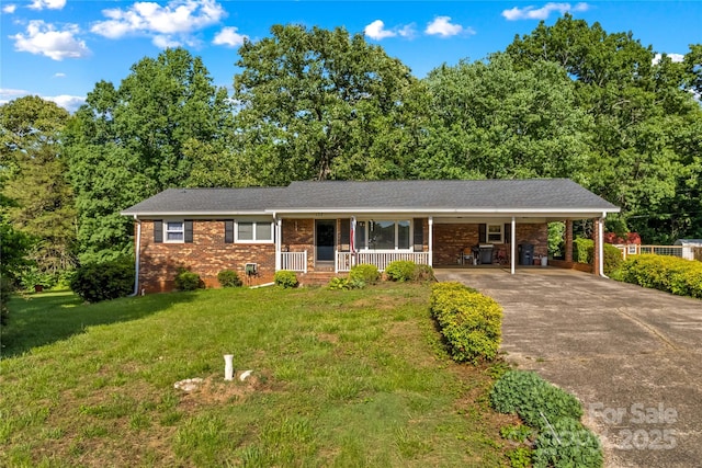 157 E Meadowview Dr, Statesville, NC 28625 - ranch-style house with covered porch, a front lawn, brick siding, driveway, and an attached carport