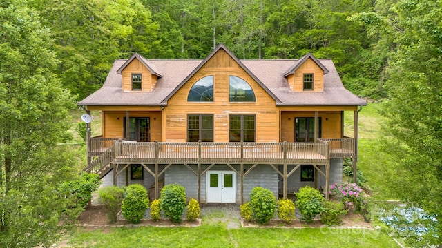 110 Mailon King Rd, Leicester, NC 28748 - back of house featuring french doors, a view of trees, a deck, and stairs