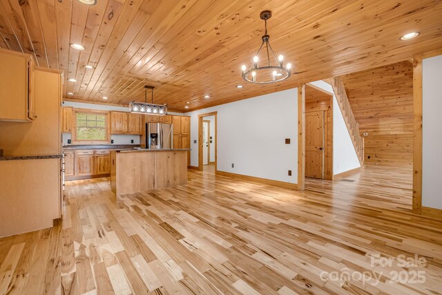 110 Mailon King Rd, Leicester, NC 28748 - kitchen featuring stainless steel fridge with ice dispenser, a chandelier, open floor plan, light wood-type flooring, and recessed lighting