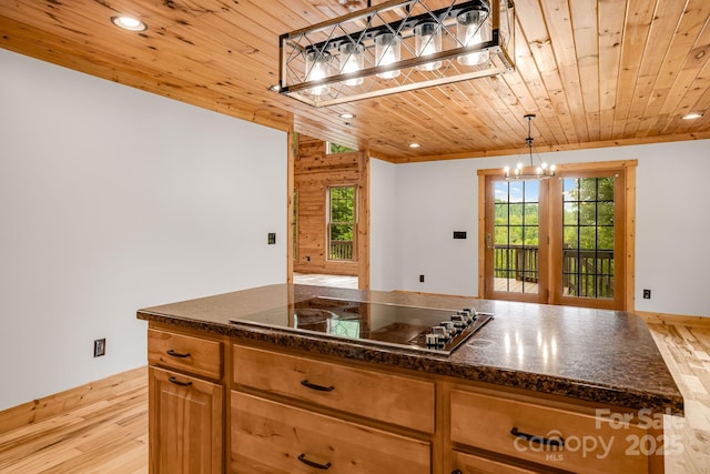 110 Mailon King Rd, Leicester, NC 28748 - kitchen featuring wooden ceiling, black electric stovetop, a chandelier, light wood-style flooring, and healthy amount of natural light
