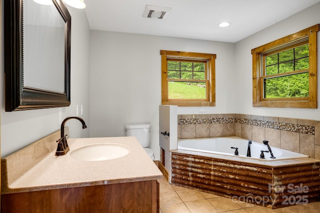 110 Mailon King Rd, Leicester, NC 28748 - bathroom featuring tile patterned floors, a bath, toilet, and vanity