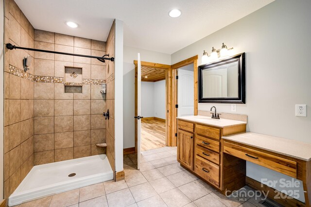 110 Mailon King Rd, Leicester, NC 28748 - full bath featuring tiled shower, vanity, recessed lighting, baseboards, and tile patterned flooring
