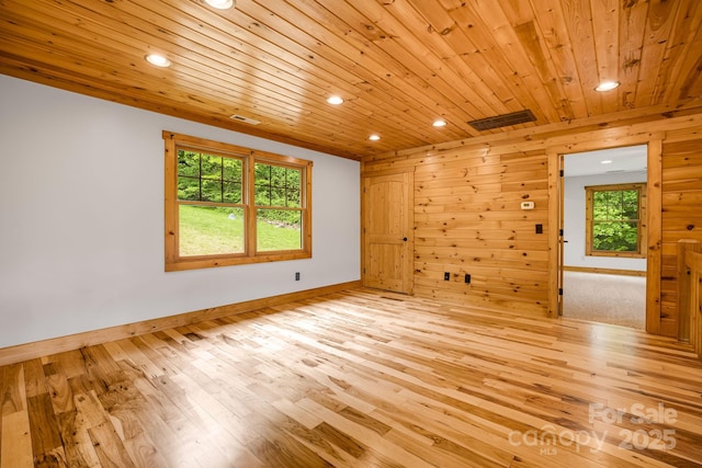 110 Mailon King Rd, Leicester, NC 28748 - unfurnished room featuring recessed lighting, wood ceiling, light wood finished floors, baseboards, and healthy amount of natural light