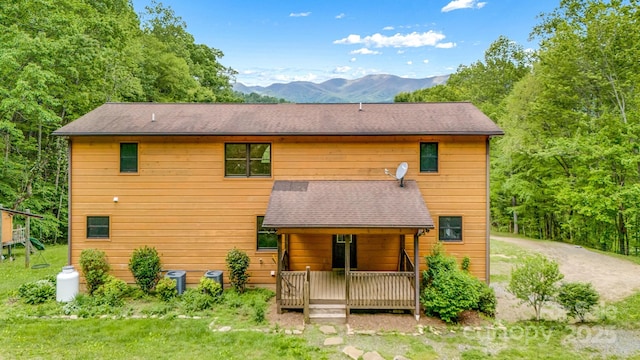 110 Mailon King Rd, Leicester, NC 28748 - rear view of property featuring a mountain view, a shingled roof, and covered porch