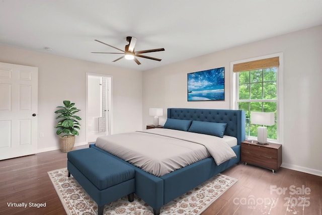 10749 Kingsview Dr, Davidson, NC 28036 - bedroom with wood finished floors, baseboards, and a ceiling fan