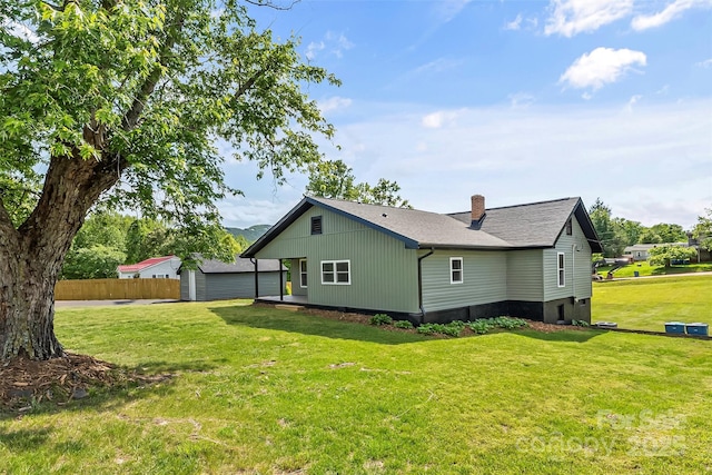 800 Hoyle St SW, Valdese, NC 28690 - view of side of home featuring a chimney