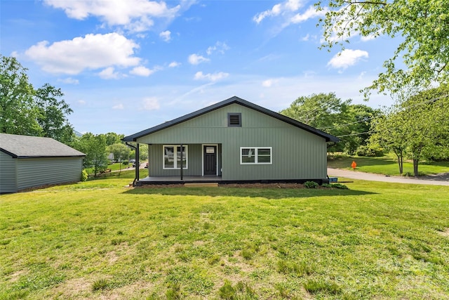 800 Hoyle St SW, Valdese, NC 28690 - rear view of property with covered porch and a lawn