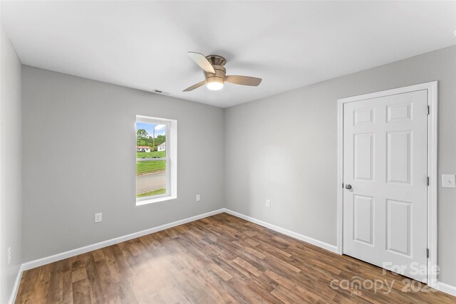 800 Hoyle St SW, Valdese, NC 28690 - empty room featuring a ceiling fan, baseboards, and wood finished floors