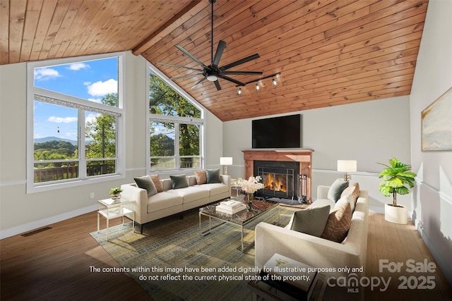 84 Halfmoon Way, Clyde, NC 28721 - living area featuring wood ceiling, ceiling fan, a glass covered fireplace, baseboards, and beamed ceiling
