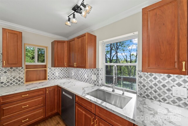 84 Halfmoon Way, Clyde, NC 28721 - kitchen featuring stainless steel dishwasher, a sink, backsplash, ornamental molding, and healthy amount of natural light