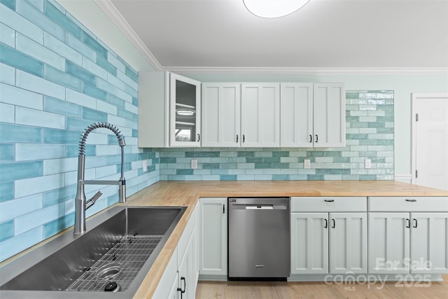 84 Halfmoon Way, Clyde, NC 28721 - kitchen featuring stainless steel dishwasher, butcher block counters, a sink, crown molding, and backsplash