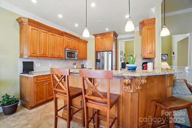 129 Daniel Efird Dr, Mount Holly, NC 28120 - kitchen with stainless steel appliances, a peninsula, tasteful backsplash, light stone countertops, and ornamental molding