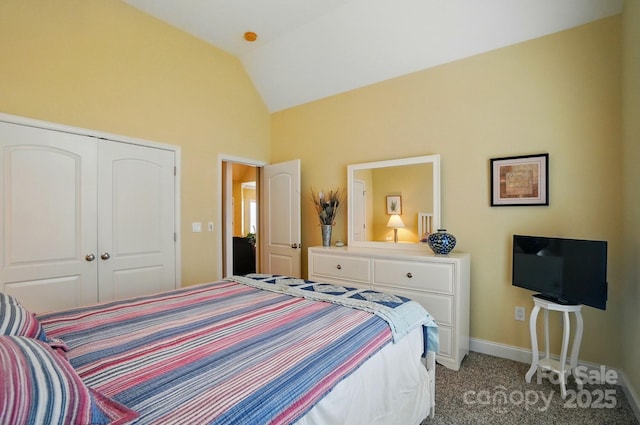 129 Daniel Efird Dr, Mount Holly, NC 28120 - bedroom with light carpet, lofted ceiling, a closet, and baseboards