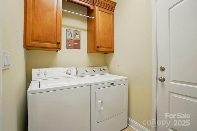 129 Daniel Efird Dr, Mount Holly, NC 28120 - laundry room with cabinet space and washing machine and dryer