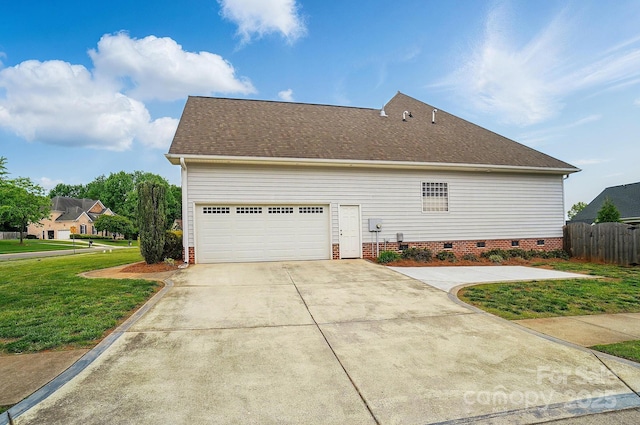 129 Daniel Efird Dr, Mount Holly, NC 28120 - view of property exterior featuring crawl space, concrete driveway, and roof with shingles