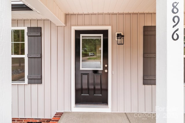 896 Oval St, Kannapolis, NC 28081 - property entrance with board and batten siding