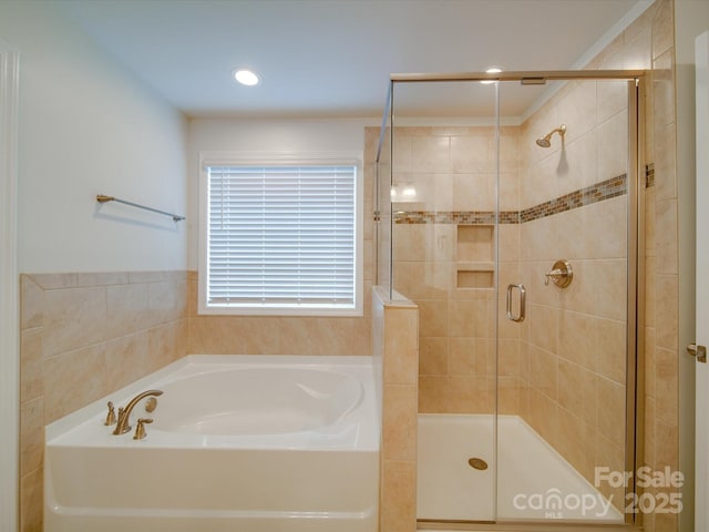 full bath featuring a bath and a shower stall