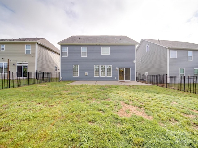 rear view of property with a patio area