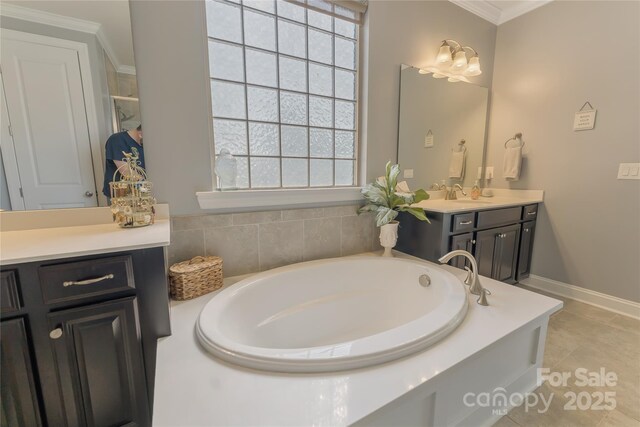 11333 Preservation Ln, Charlotte, NC 28278 - bathroom with vanity, a garden tub, crown molding, and tile patterned flooring