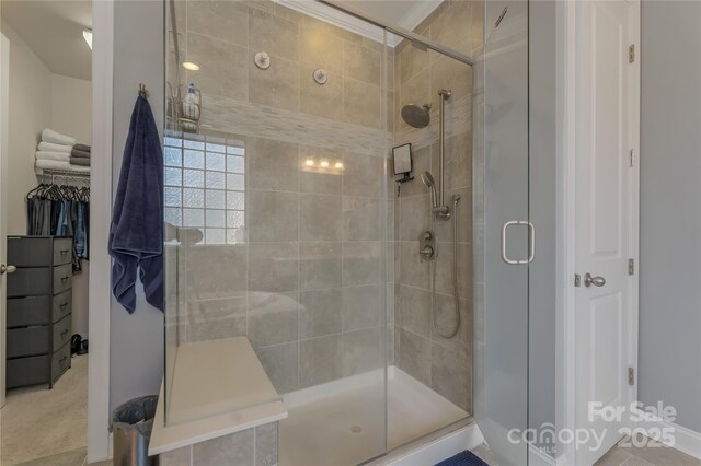 11333 Preservation Ln, Charlotte, NC 28278 - full bathroom featuring a stall shower and a walk in closet