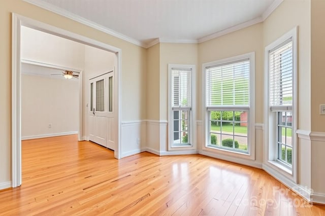 4619 Glasgow Ct, Gastonia, NC 28056 - spare room with light wood-type flooring, plenty of natural light, crown molding, and ceiling fan