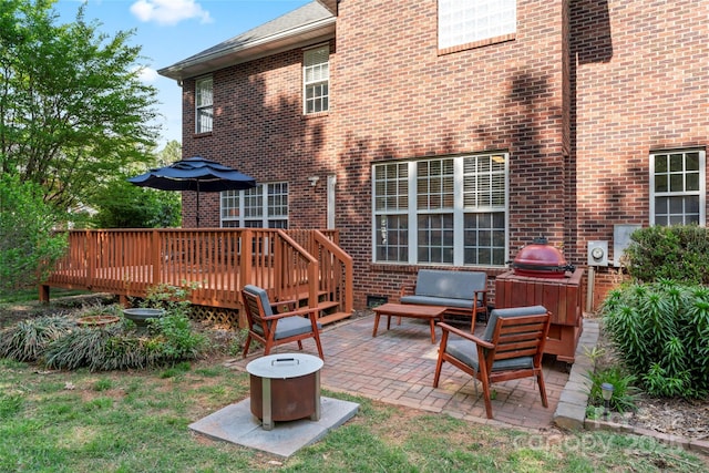 4619 Glasgow Ct, Gastonia, NC 28056 - rear view of house featuring brick siding, a patio, and a deck