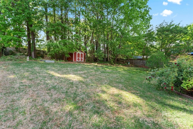 4619 Glasgow Ct, Gastonia, NC 28056 - fenced backyard with a storage unit