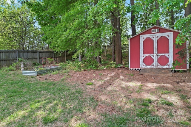 4619 Glasgow Ct, Gastonia, NC 28056 - fenced backyard with a shed and a garden