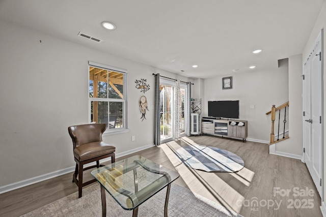 2665 Grantham Place Dr, Fort Mill, SC 29715 - living area with stairs, wood finished floors, and recessed lighting