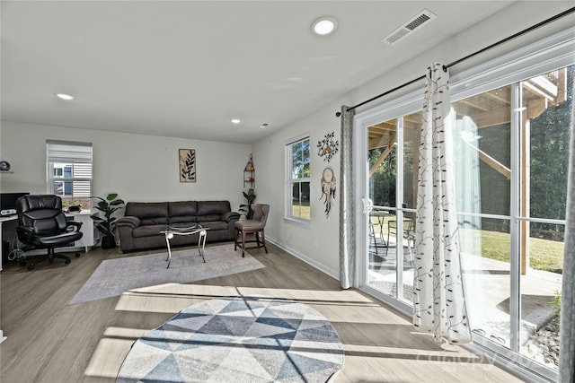 2665 Grantham Place Dr, Fort Mill, SC 29715 - living room with recessed lighting, plenty of natural light, wood finished floors, and a desk