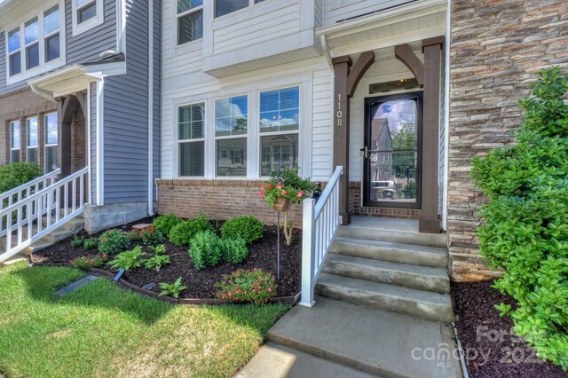 110 Synandra Dr Unit B, Mooresville, NC 28117 - view of exterior entry with brick siding