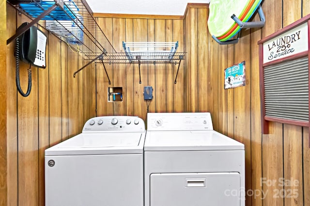 301 Pinnacle Inn Rd Unit 2210, Beech Mountain, NC 28604 - laundry room with wooden walls and washing machine and dryer
