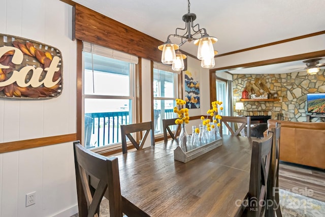 301 Pinnacle Inn Rd Unit 2210, Beech Mountain, NC 28604 - dining space with healthy amount of natural light, a chandelier, wood finished floors, ceiling fan, and ornamental molding