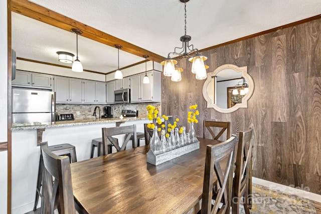 301 Pinnacle Inn Rd Unit 2210, Beech Mountain, NC 28604 - dining space featuring a chandelier, beamed ceiling, and wooden walls
