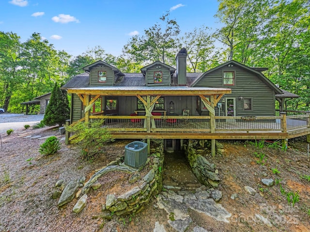 214 Hubert Mccall Rd, Balsam Grove, NC 28708 - back of house with central AC, a chimney, a deck, and board and batten siding