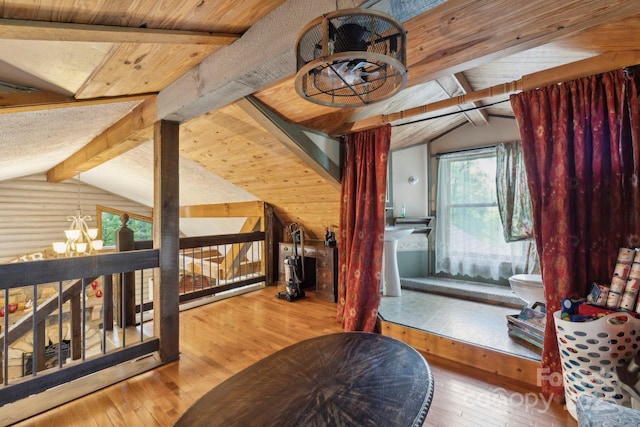 214 Hubert Mccall Rd, Balsam Grove, NC 28708 - bonus room with a chandelier and hardwood / wood-style floors