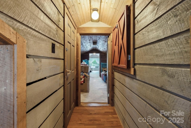 214 Hubert Mccall Rd, Balsam Grove, NC 28708 - corridor with vaulted ceiling, wood finished floors, and wood walls