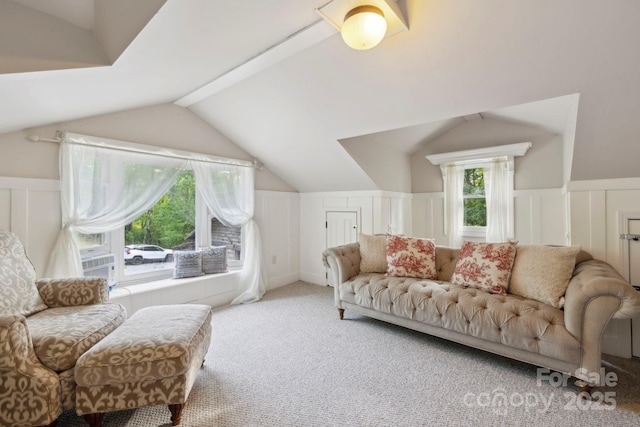 214 Hubert Mccall Rd, Balsam Grove, NC 28708 - living area featuring vaulted ceiling, carpet floors, and a decorative wall