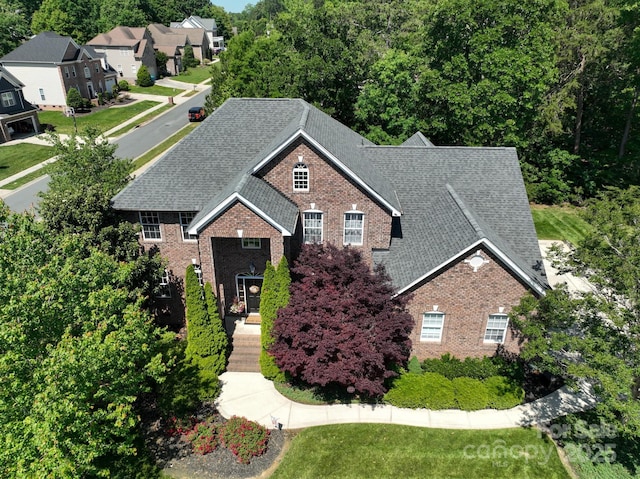 201 Vanderbilt Blvd, Locust, NC 28097 - view of front of property featuring brick siding and a shingled roof