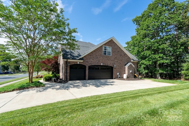 201 Vanderbilt Blvd, Locust, NC 28097 - view of side of home with brick siding, concrete driveway, a yard, and a shingled roof