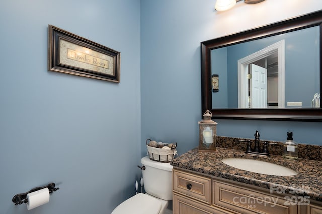 201 Vanderbilt Blvd, Locust, NC 28097 - half bathroom featuring vanity and toilet